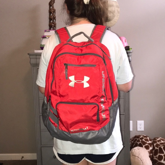red and gray under armour backpack